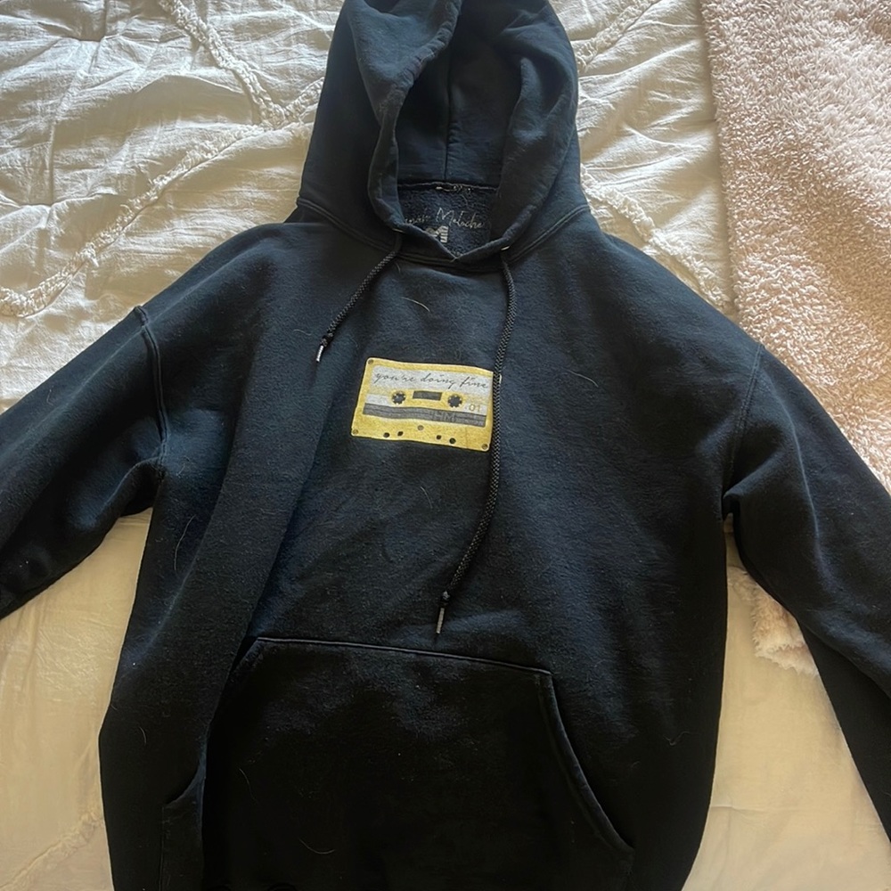 Hannah Meloche’s merch sweatshirt
